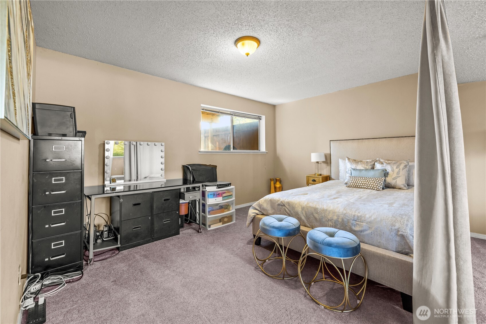 1601 Olympia Avenue Southeast Renton, WA 98058 - Photo 23 of 28 a bedroom with a bed and furniture