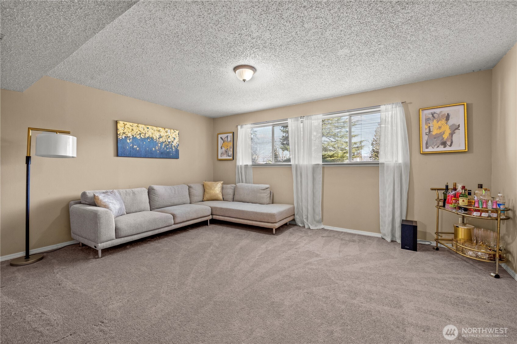 1601 Olympia Avenue Southeast Renton, WA 98058 - Photo 24 of 28 a living room with furniture and a window