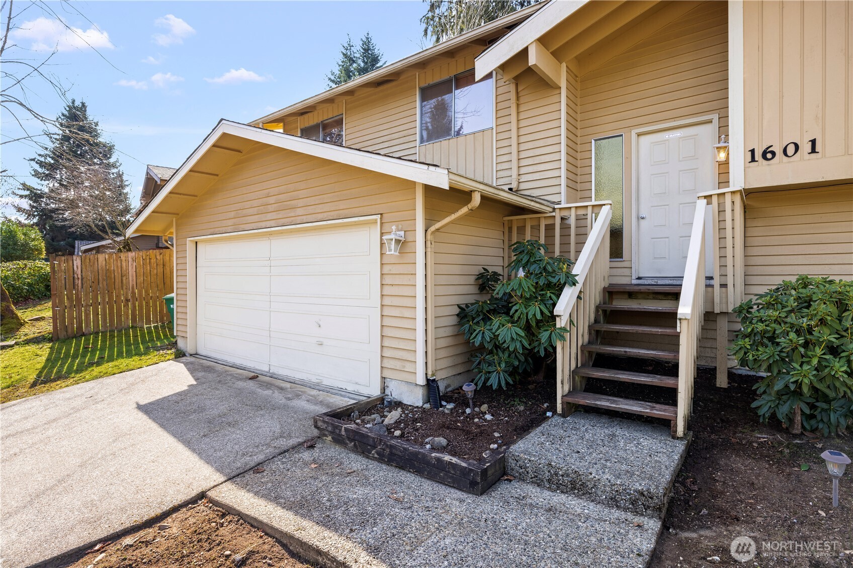 1601 Olympia Avenue Southeast Renton, WA 98058 - Photo 28 of 28 a view of a house with wooden fence