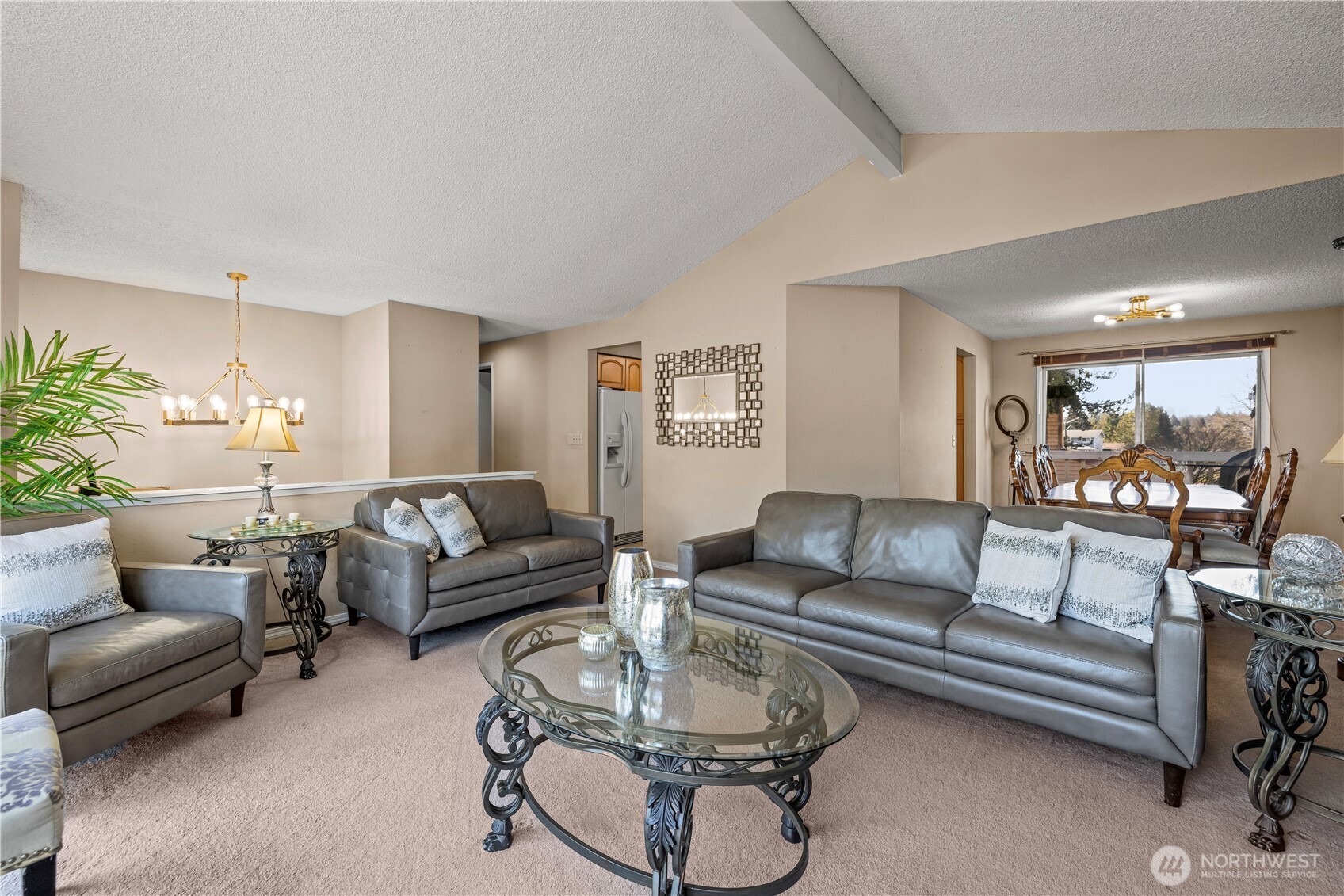 1601 Olympia Avenue Southeast Renton, WA 98058 - Photo 5 of 28 a living room with furniture and a large window