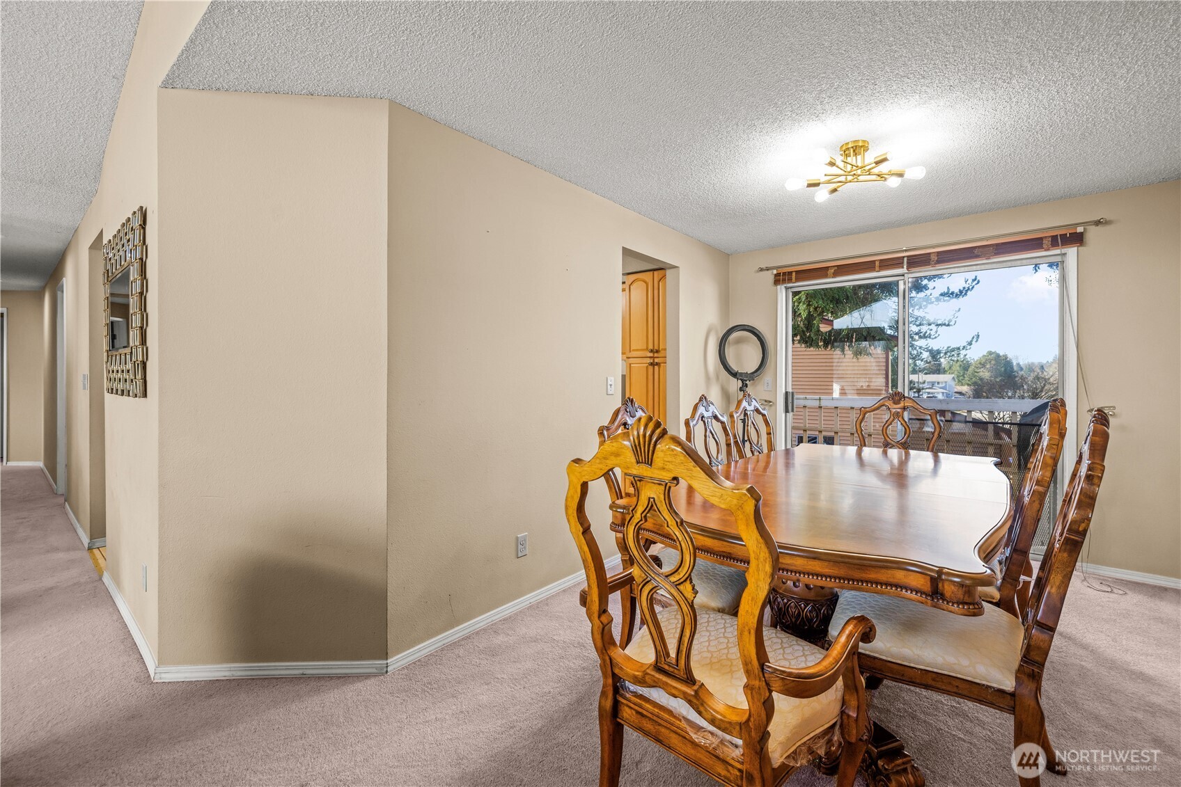 1601 Olympia Avenue Southeast Renton, WA 98058 - Photo 10 of 28 a dining room with furniture and chandelier
