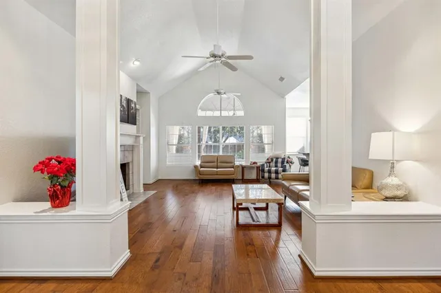 a view of a living room and dining room