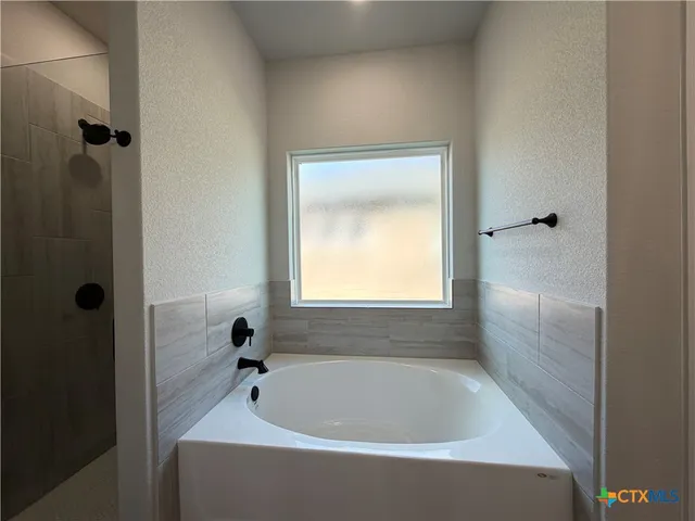 a bathroom with a tub