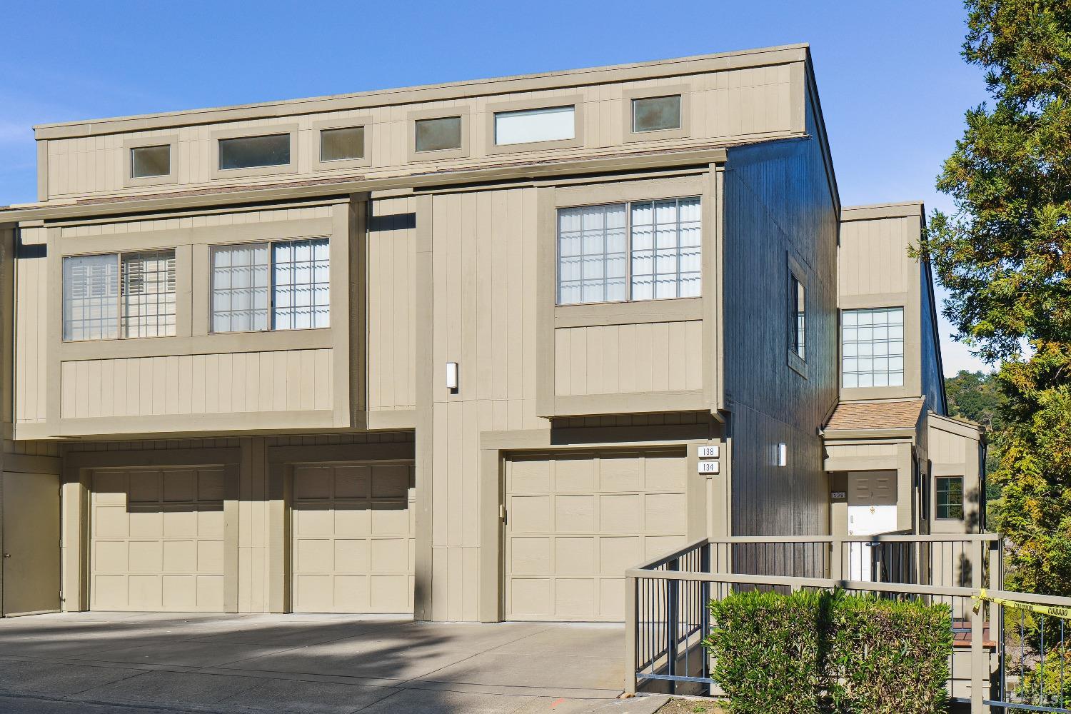 134 Redhawk Road Novato, CA 94949 - Photo 1 of 18 a front view of a house with a garage
