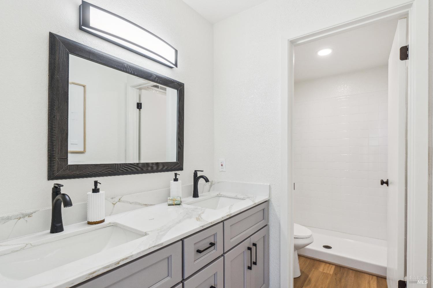 134 Redhawk Road Novato, CA 94949 - Photo 14 of 18 a bathroom with a sink and a mirror
