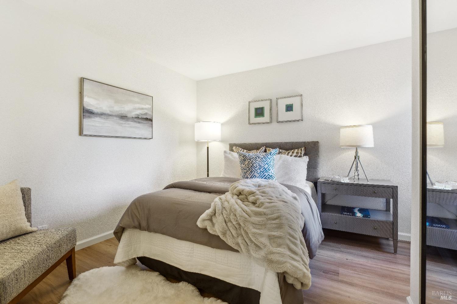 134 Redhawk Road Novato, CA 94949 - Photo 17 of 18 a bedroom with a bed and a couch