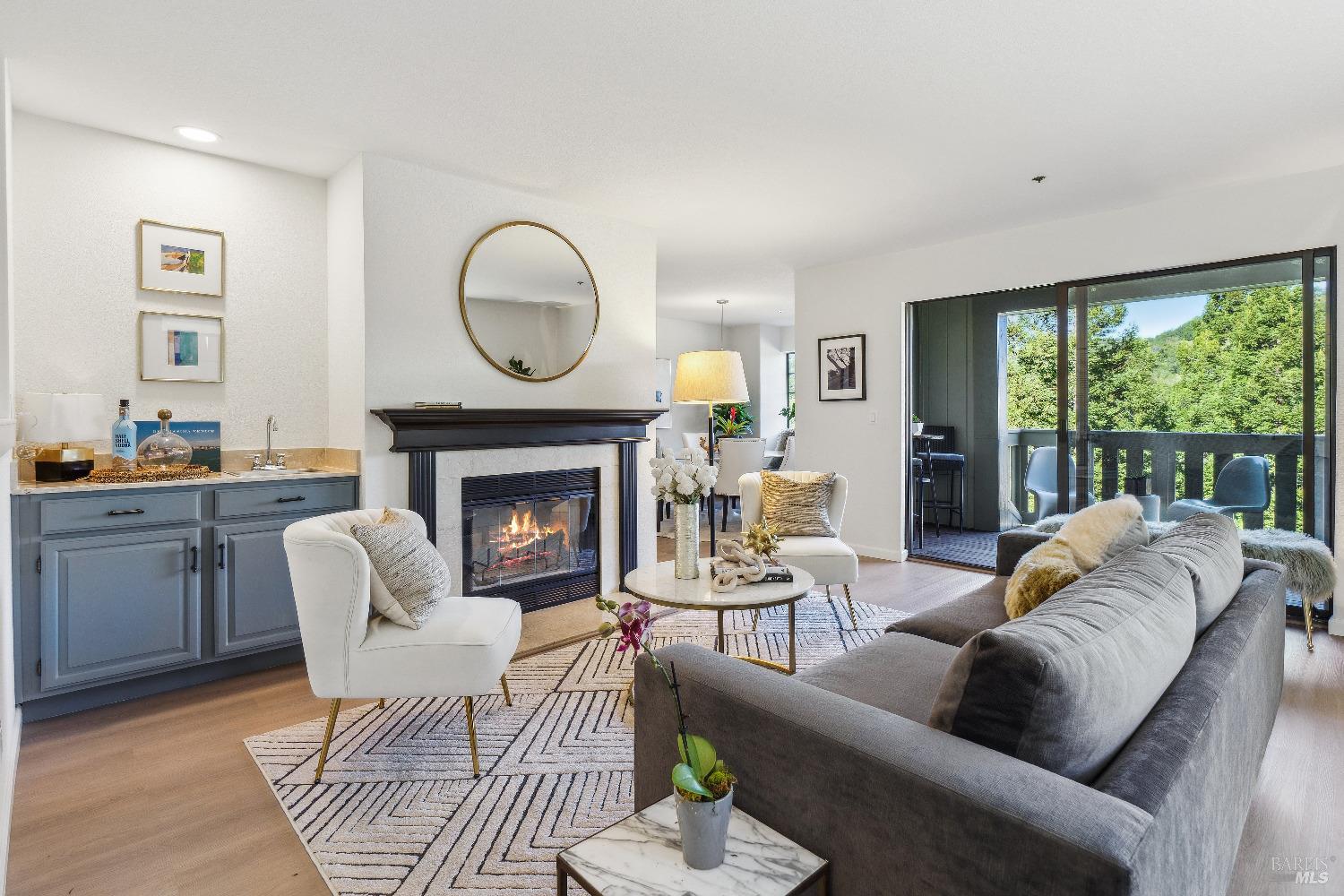 134 Redhawk Road Novato, CA 94949 - Photo 2 of 18 a living room with furniture a large window and a fireplace