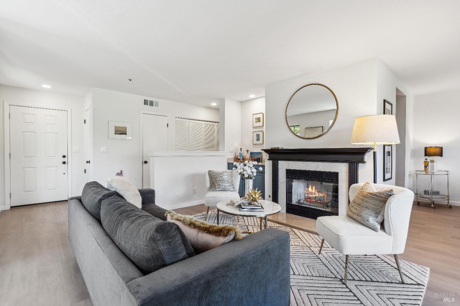 134 Redhawk Road Novato, CA 94949 - Photo 3 of 18 a living room with furniture a fireplace and a fireplace