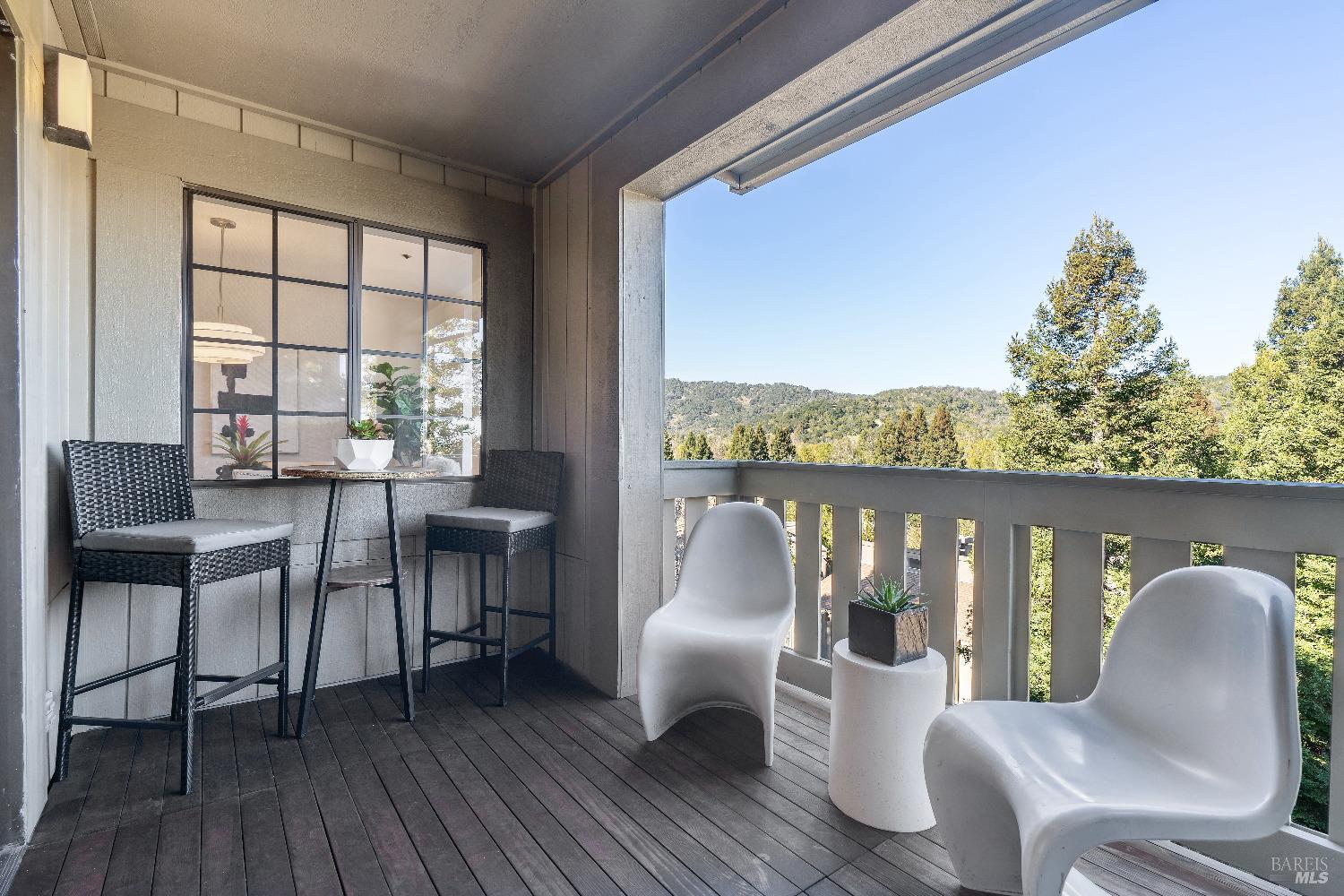 134 Redhawk Road Novato, CA 94949 - Photo 8 of 18 a balcony with furniture and wooden floor