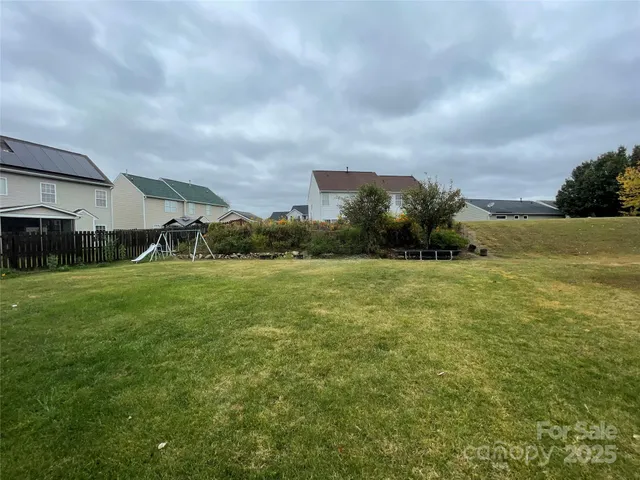 a view of a swimming pool and lounge chair
