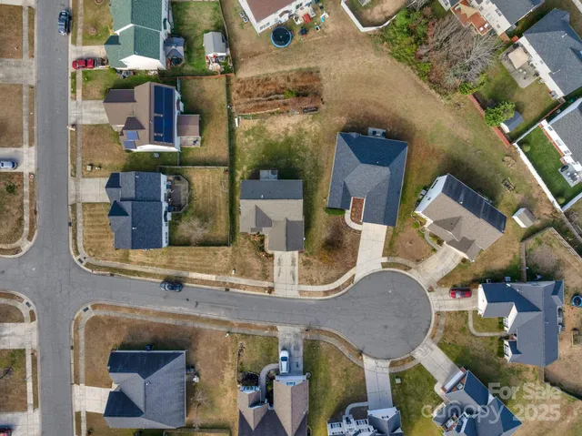 an aerial view of waterside residential houses
