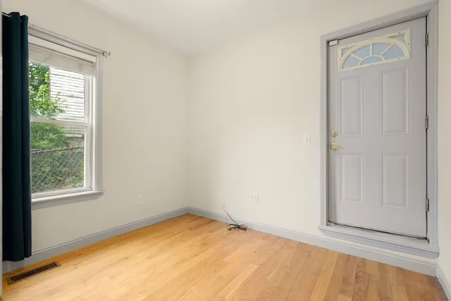 an empty room with window