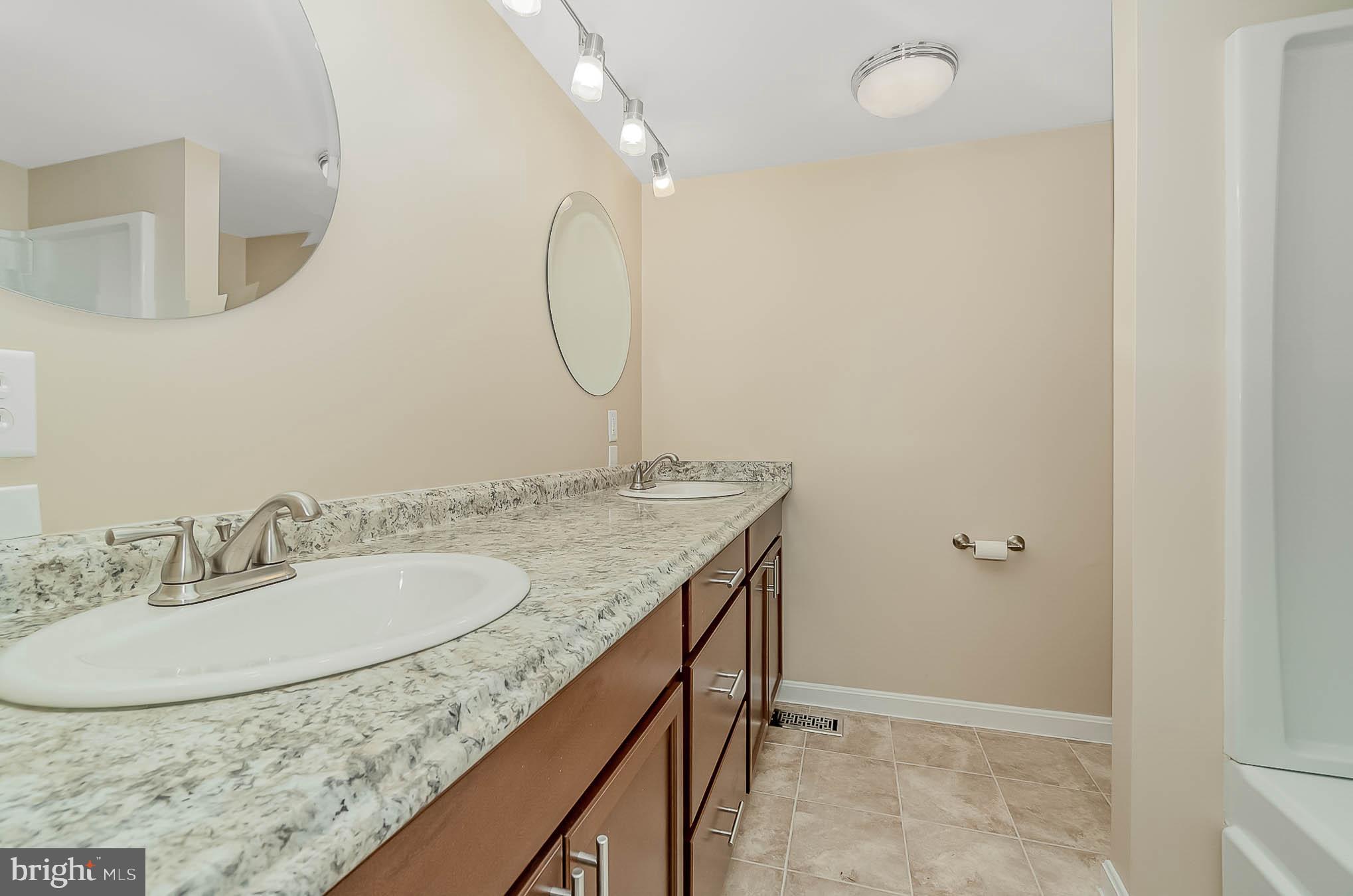 2603 Carrollton Road Finksburg, MD 21048 - Photo 19 of 37 Full Hall Bath with new ceramic floor.