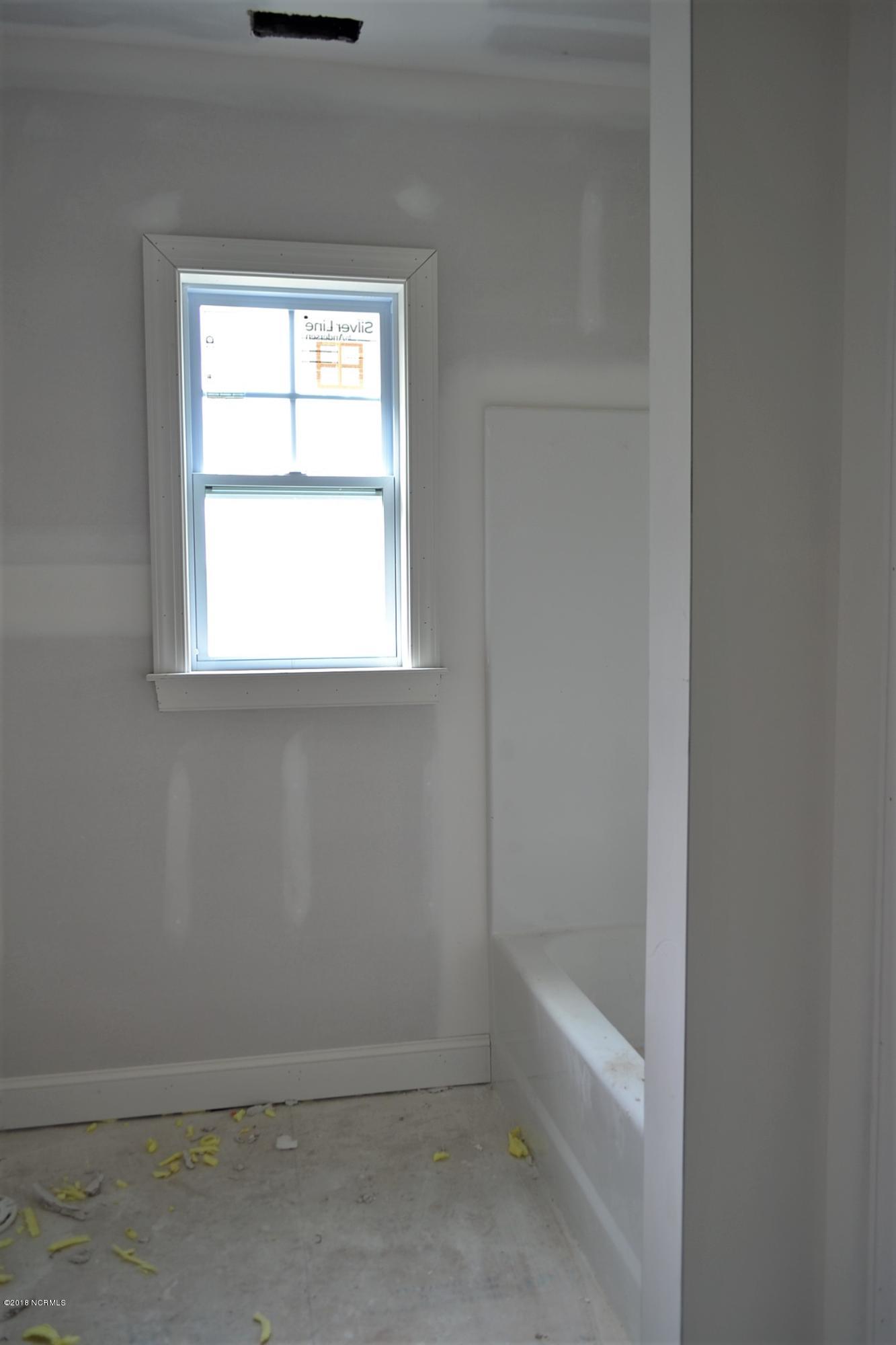 894 Hoover Road Hampstead, NC 28443 - Photo 12 of 16 Spacious guest bathroom