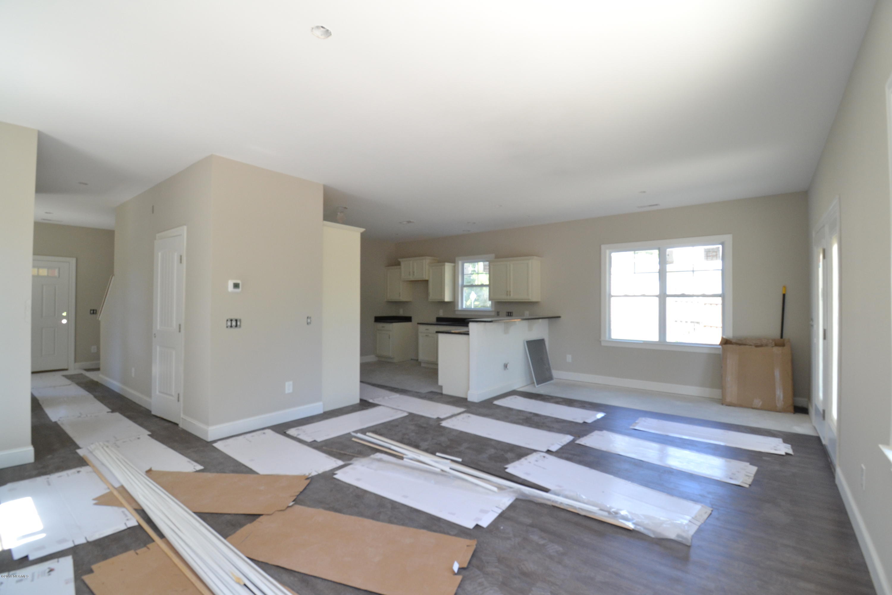 894 Hoover Road Hampstead, NC 28443 - Photo 8 of 16 Large living room with stunning LVP flooring