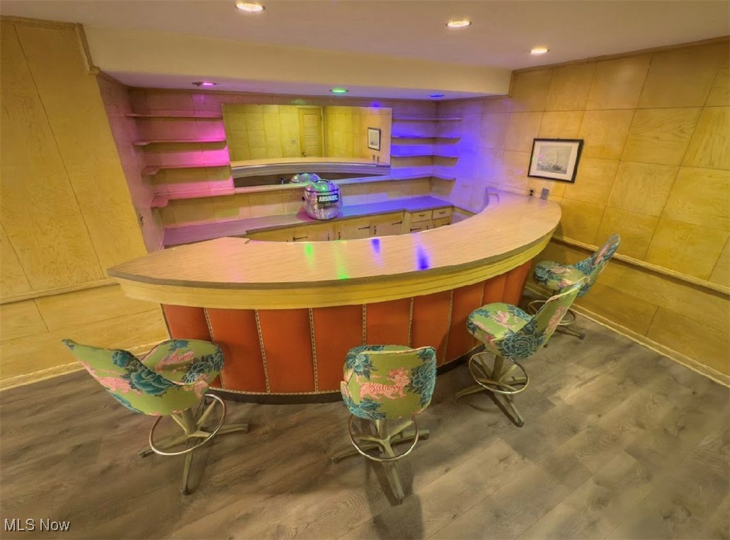 7817 Montello Road Independence, OH 44131 - Photo 28 of 35 Bar featuring light wood-type flooring