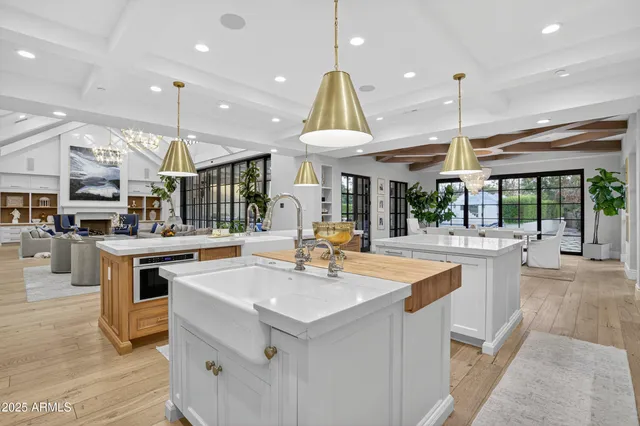 a bed room with a bed and ceiling fan