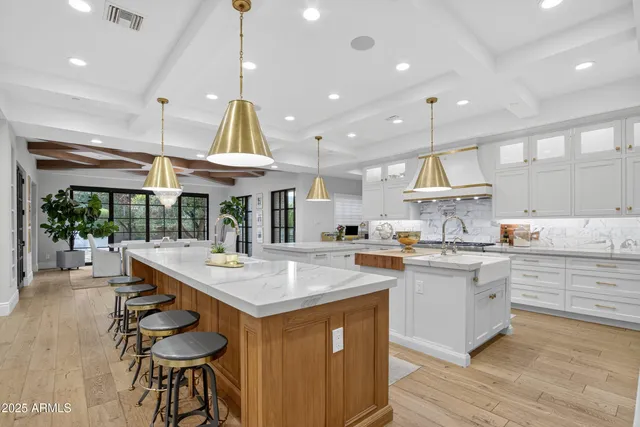a bathroom with a granite countertop shower