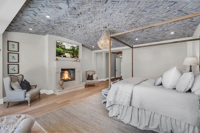 a view of a room with furniture and wooden floor