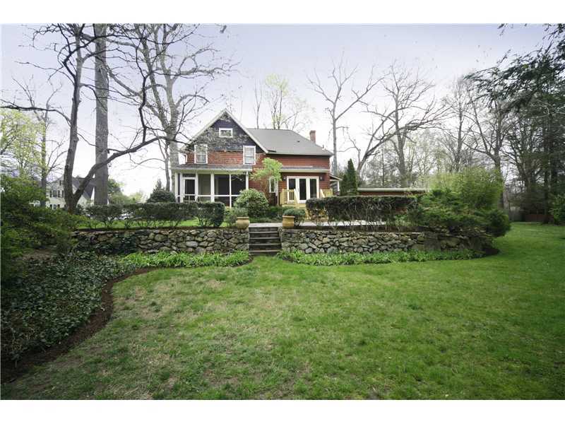 96 Rose Lane Darien, CT 06820 - Photo 1 of 23 a front view of a house with a yard