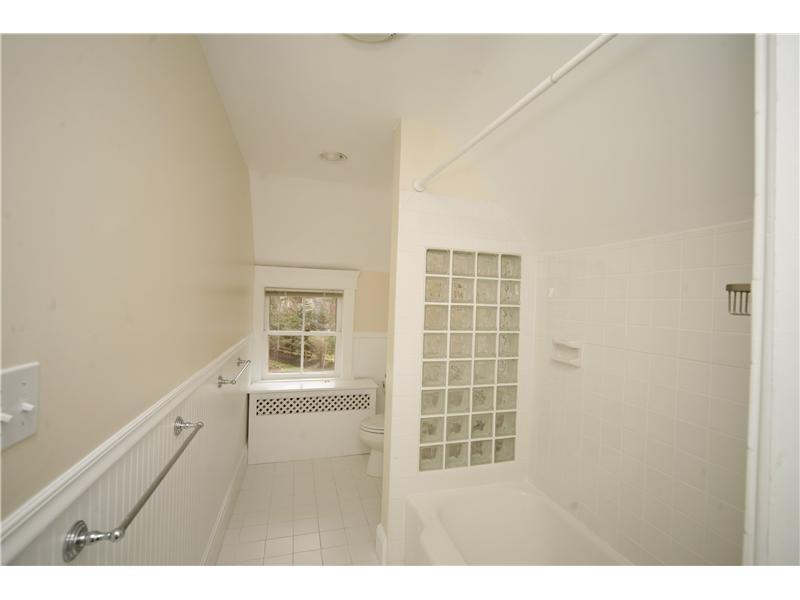 96 Rose Lane Darien, CT 06820 - Photo 17 of 23 a view of an empty room with a window