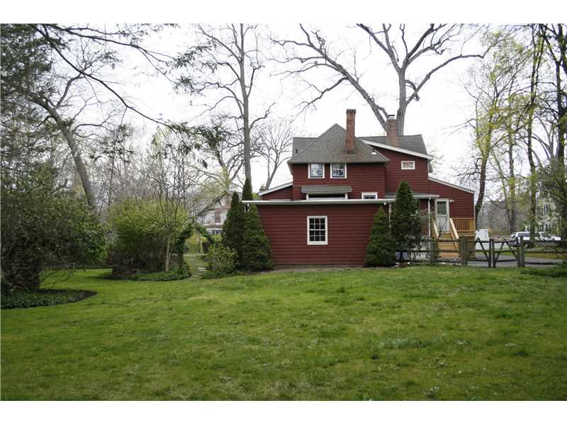 96 Rose Lane Darien, CT 06820 - Photo 20 of 23 a view of a house with a yard