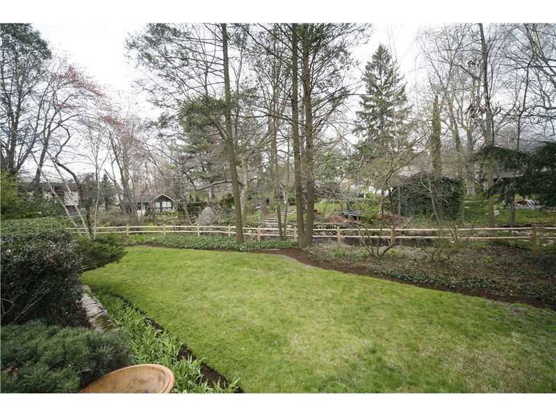 96 Rose Lane Darien, CT 06820 - Photo 2 of 23 a view of outdoor space with green field and trees