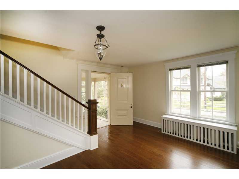 96 Rose Lane Darien, CT 06820 - Photo 6 of 23 a view of an empty room with wooden floor