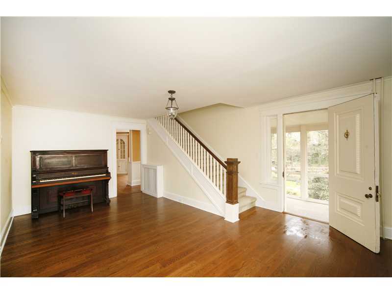 96 Rose Lane Darien, CT 06820 - Photo 7 of 23 a view of entryway and hall with wooden floor