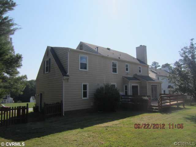 13911 Sagebrook Road Midlothian, VA 23112 - Photo 3 of 19 a front view of a house with a yard
