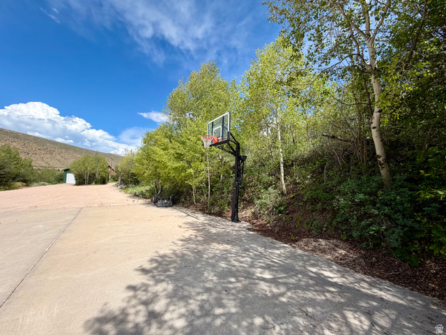 1133 Paris Canyon Road Paris, ID 83261 - Photo 61 of 75 Spacious concrete driveway featuring a basketball hoop