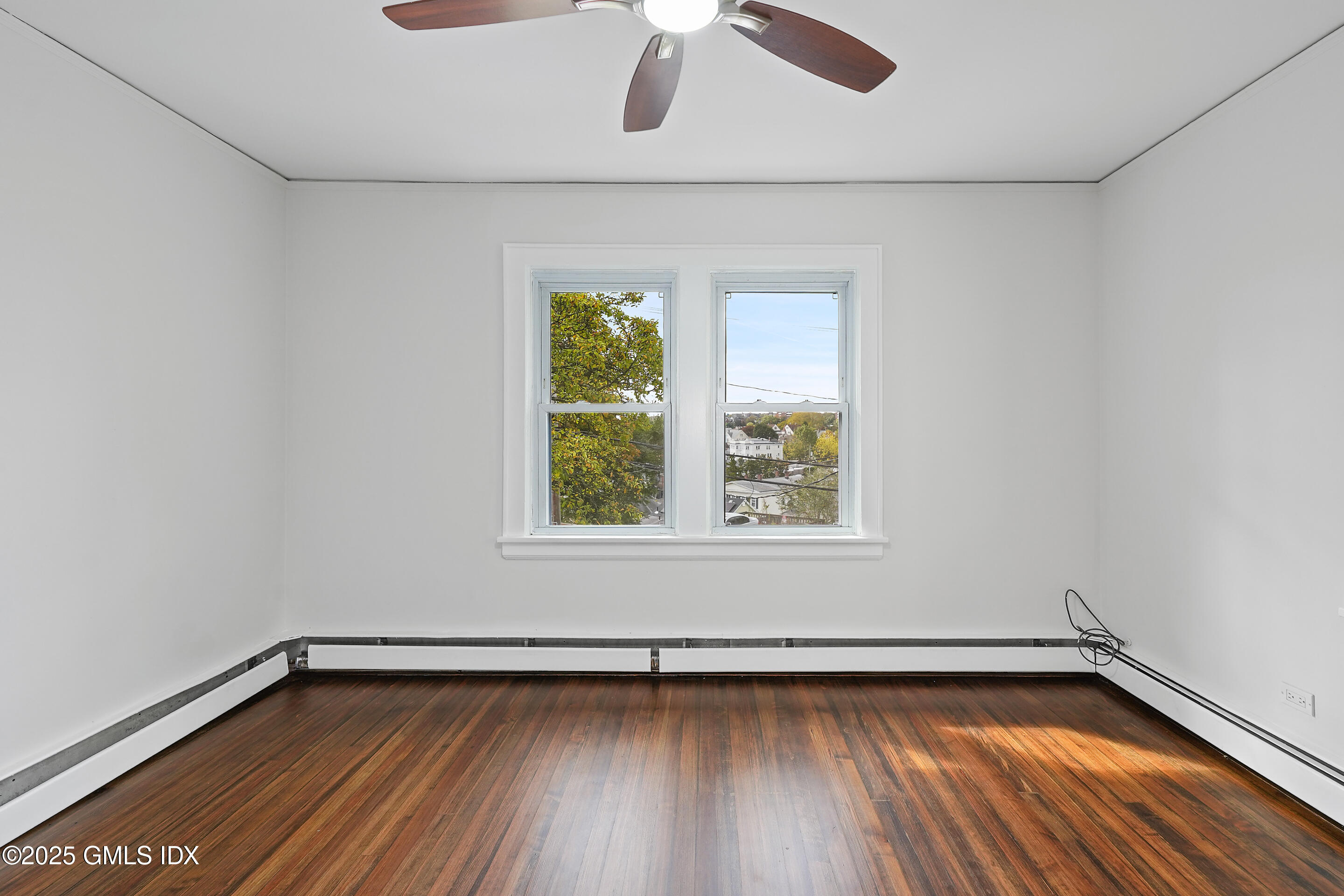 95 Byram Road Greenwich, CT 06830 - Photo 16 of 35 a view of a room with wooden floor and window