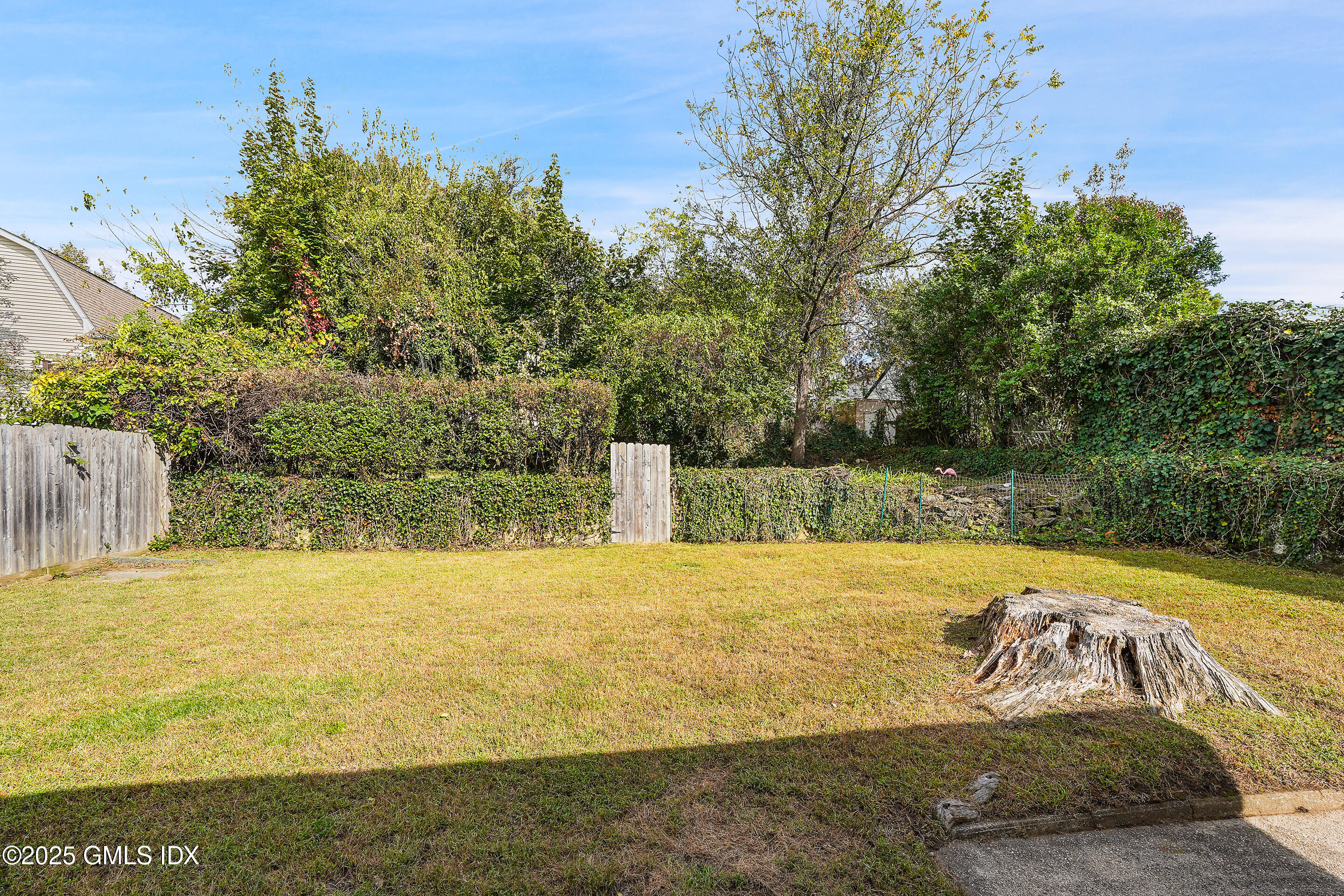 95 Byram Road Greenwich, CT 06830 - Photo 33 of 35 a view of a pool with an outdoor space and seating area