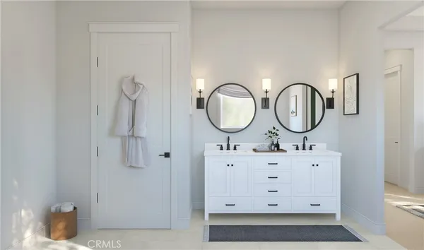 a bathroom with a mirror a sink and a mirror