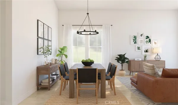a view of a dining room with furniture window and outside view