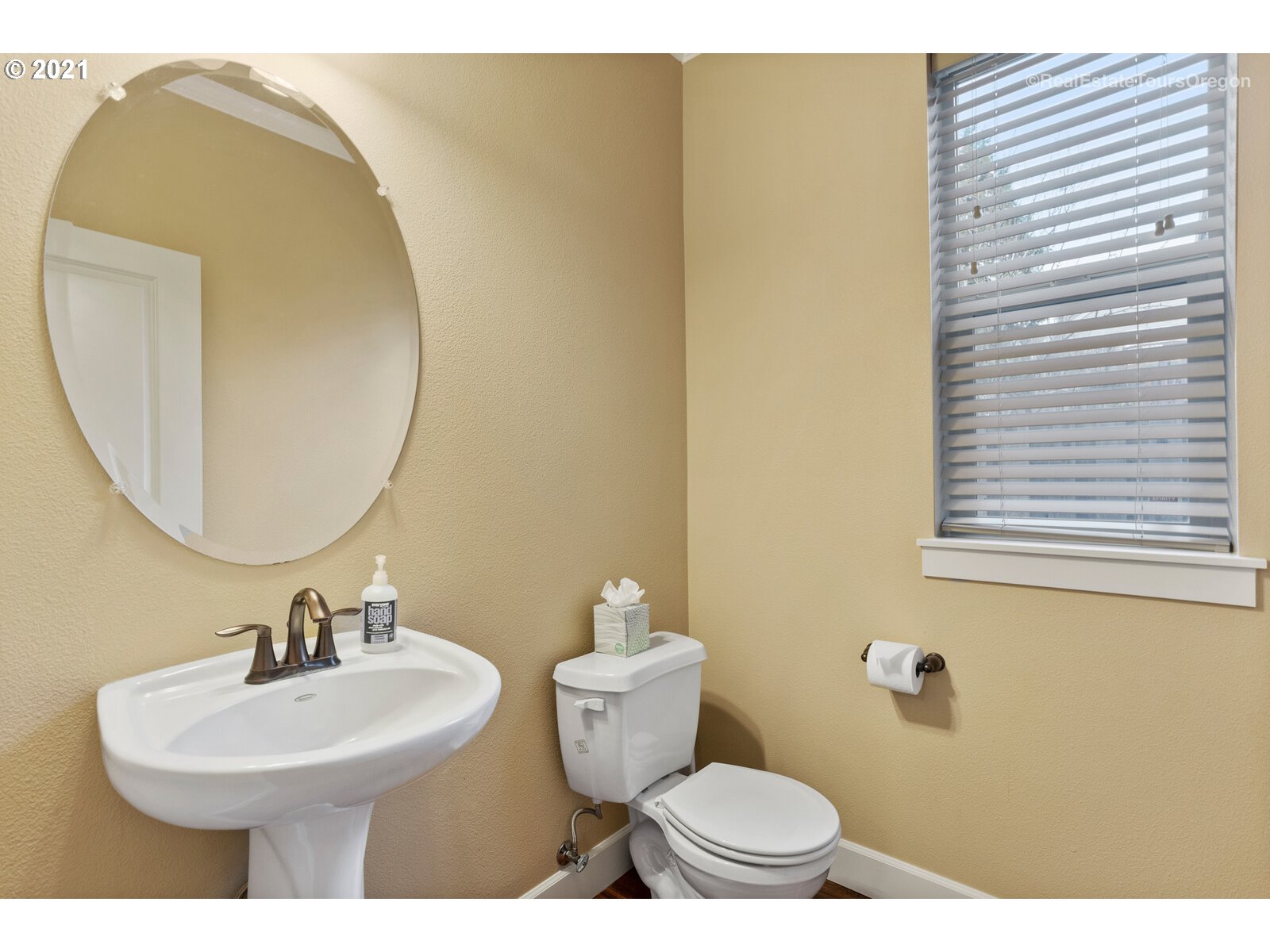 13348 Southwest Alpine View Tigard, OR 97224 - Photo 16 of 32 a bathroom with a sink and a mirror