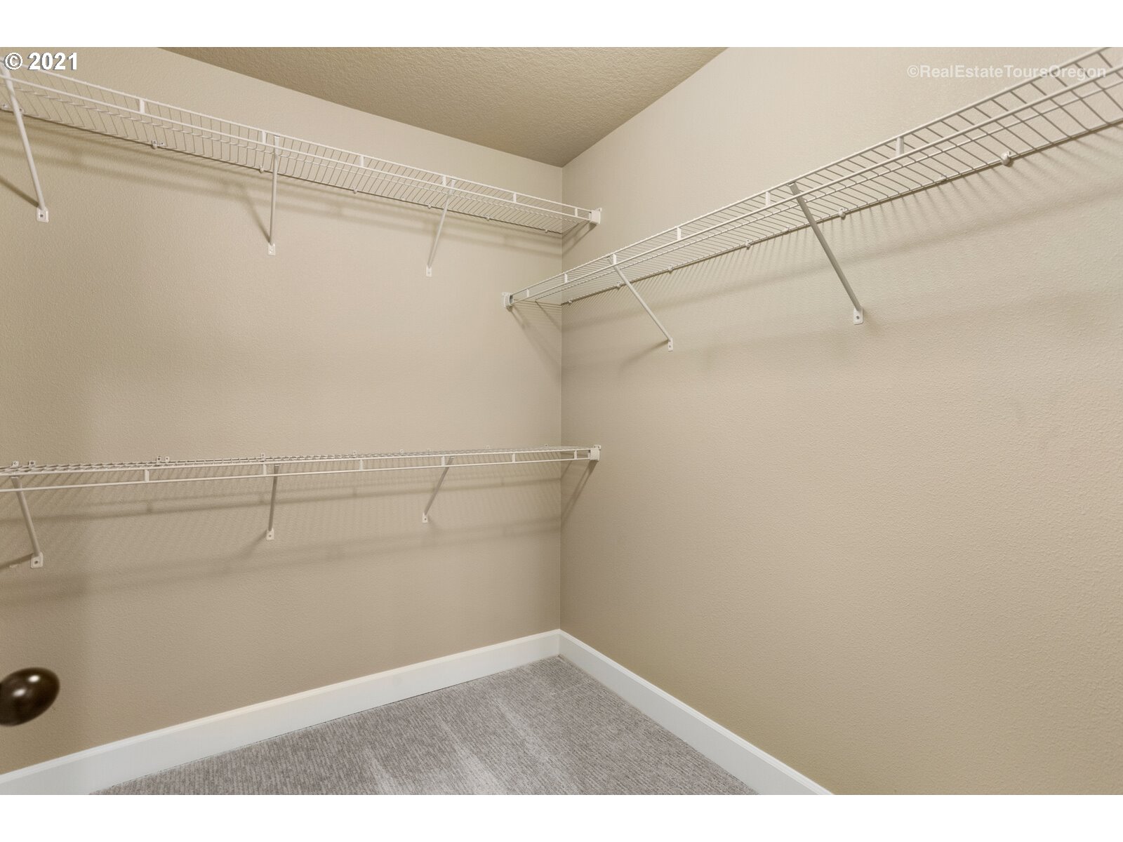 13348 Southwest Alpine View Tigard, OR 97224 - Photo 20 of 32 a view of a room with racks on the wall
