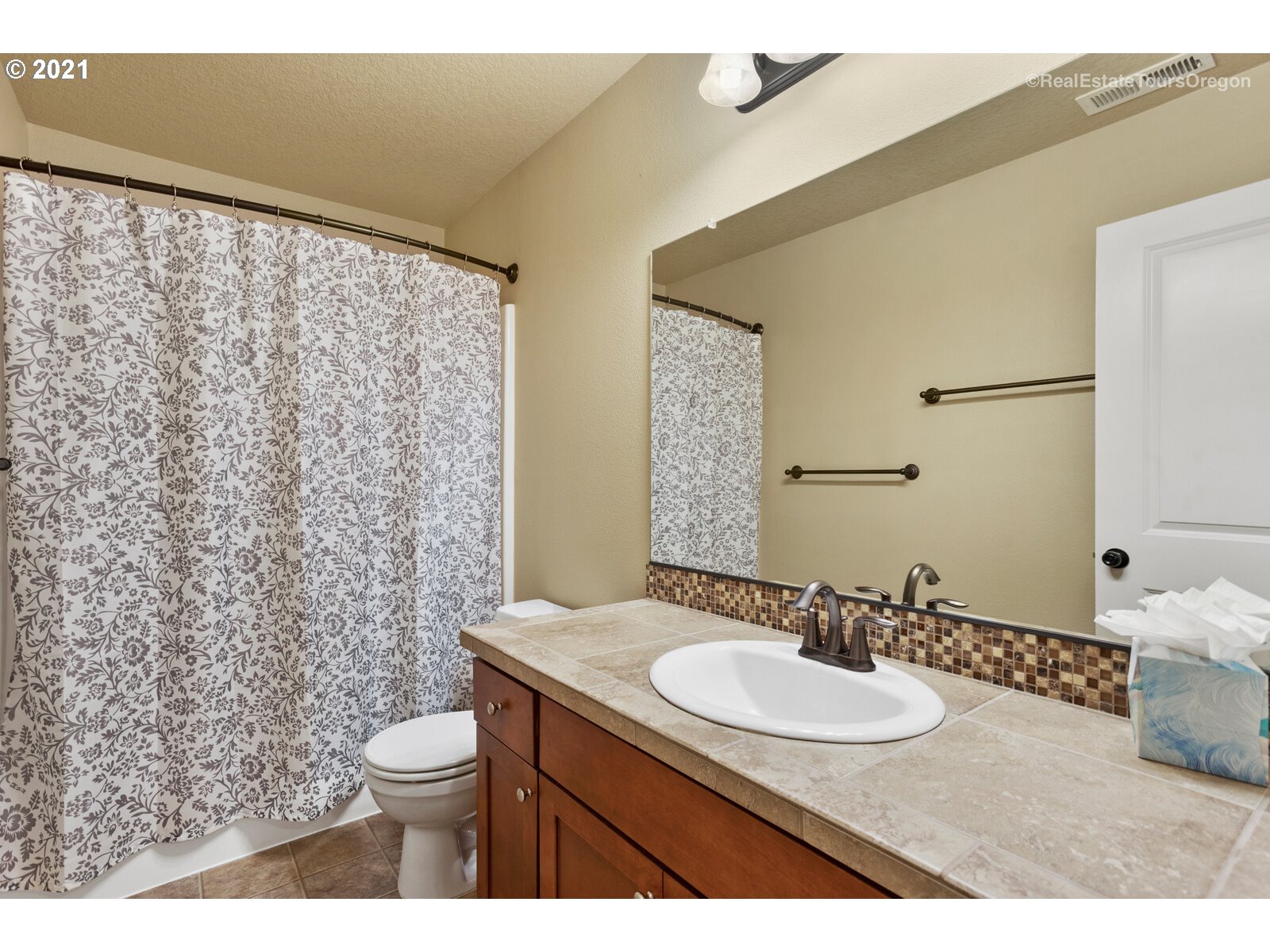 13348 Southwest Alpine View Tigard, OR 97224 - Photo 22 of 32 a bathroom with a sink toilet and shower