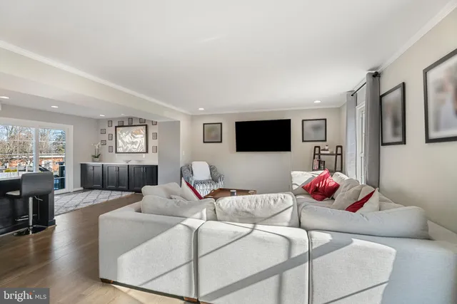 a kitchen with a refrigerator and a stove