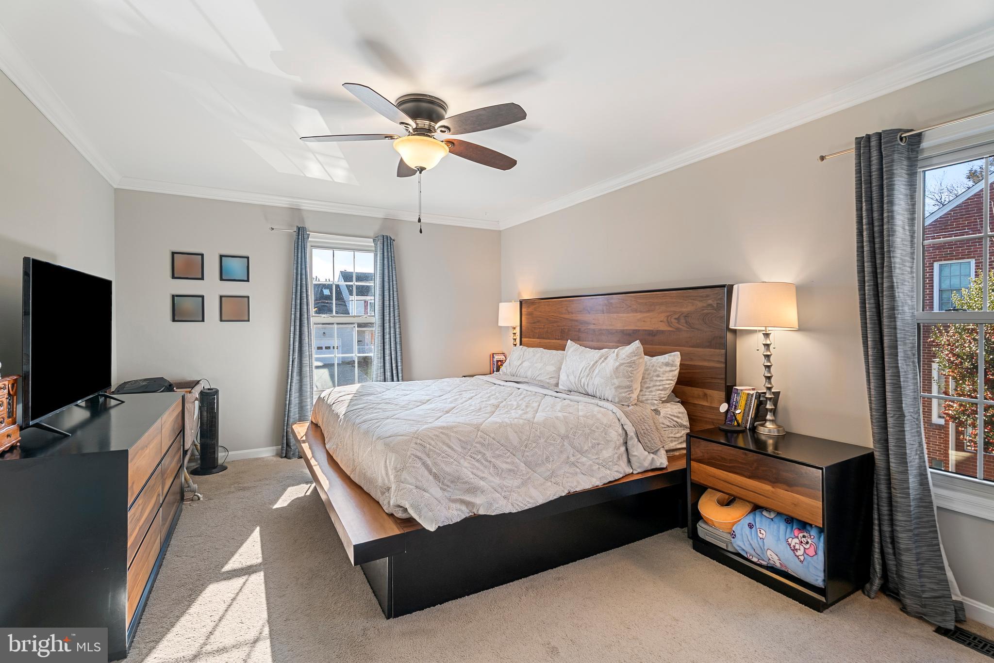3100 Franklin Street Alexandria, VA 22306 - Photo 37 of 55 a bedroom with a bed and a flat screen tv