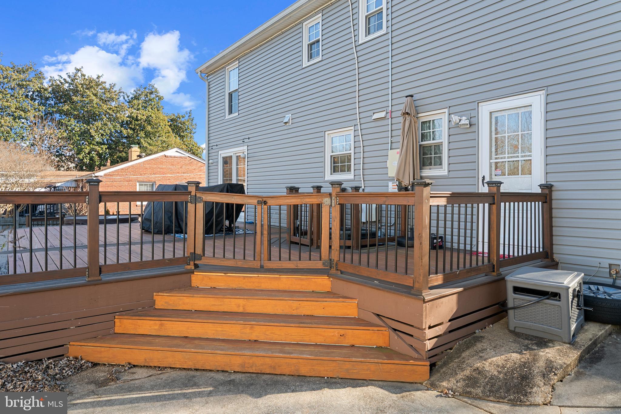 3100 Franklin Street Alexandria, VA 22306 - Photo 44 of 55 a view of a house with a wooden deck
