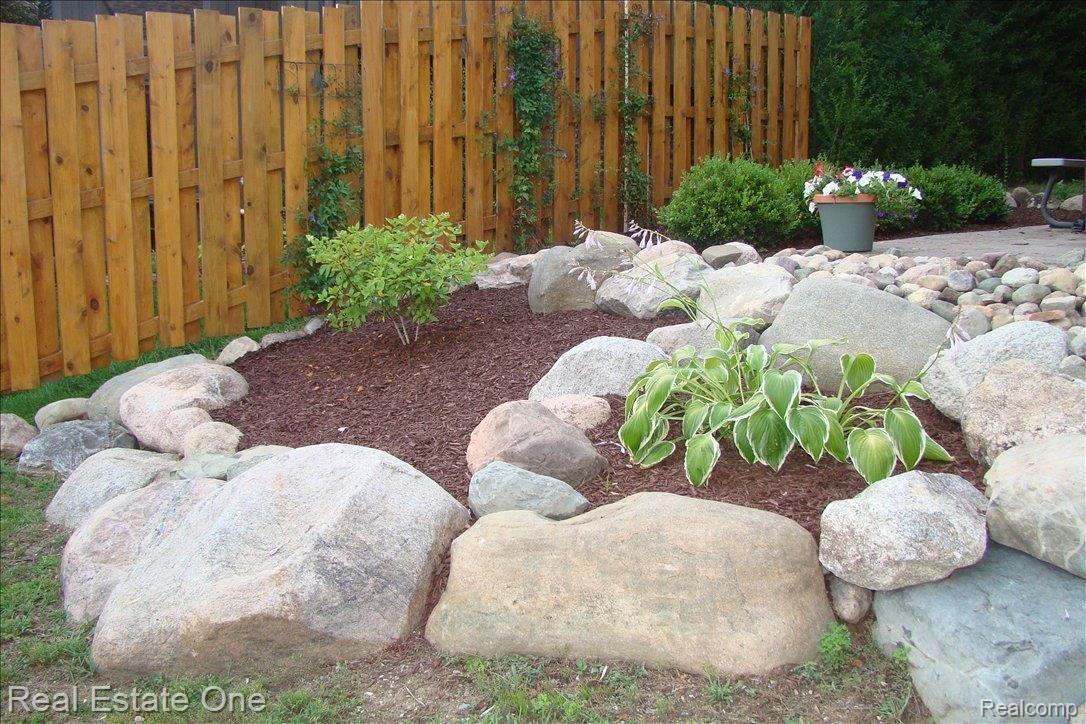 665 Gravel Ridge Road Leonard, MI 48367 - Photo 8 of 17 ROCK GARDENS/PERRENIAL PLANTINGS