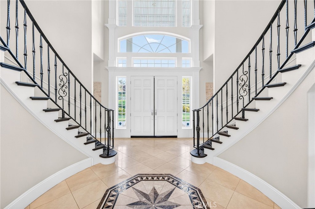 41515 Vía Del Monte Temecula, CA 92592 - Photo 11 of 64 a view of entryway and hall with wooden floor