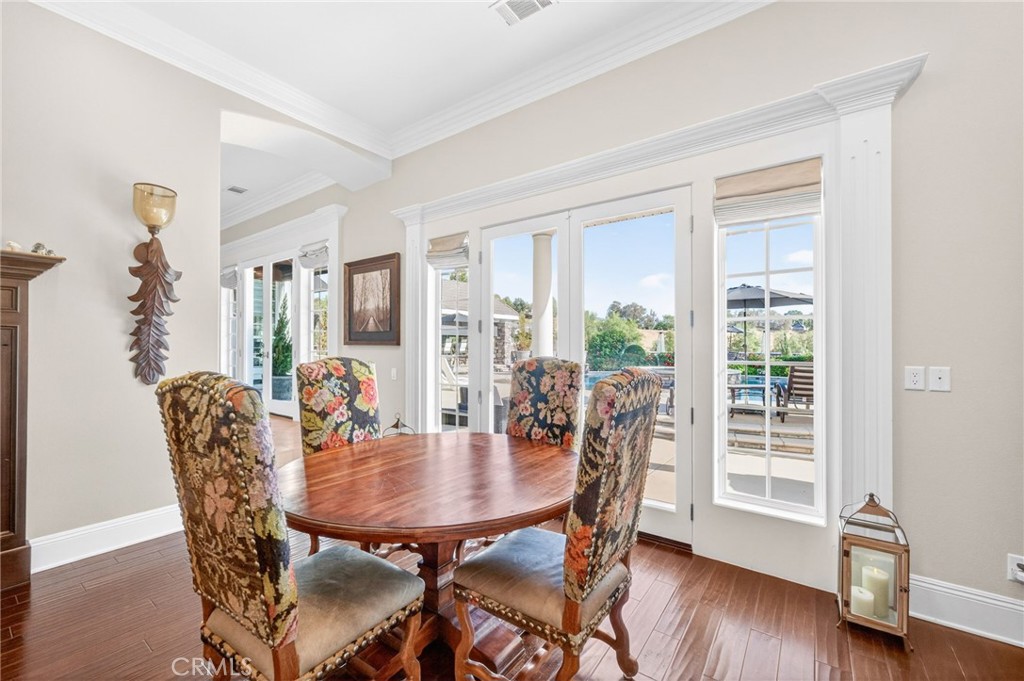 41515 Vía Del Monte Temecula, CA 92592 - Photo 23 of 64 a view of a dining room with furniture window and wooden floor