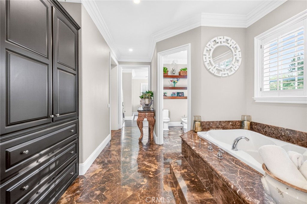 41515 Vía Del Monte Temecula, CA 92592 - Photo 29 of 64 a bathroom with a bathtub and a shower
