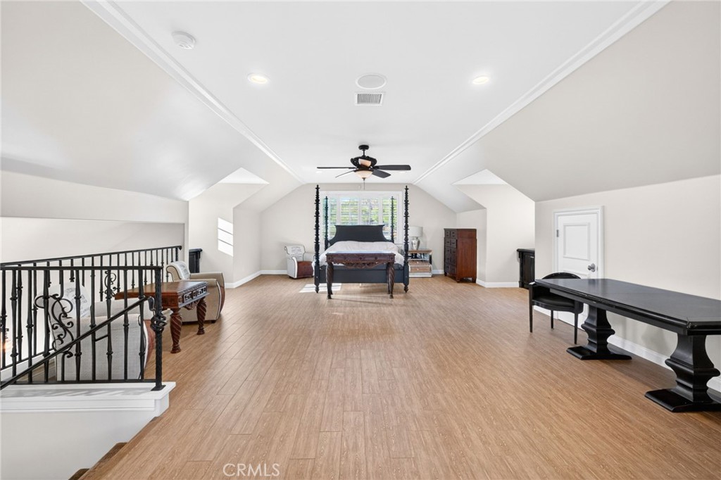 41515 Vía Del Monte Temecula, CA 92592 - Photo 51 of 64 a living room with furniture and a wooden floor
