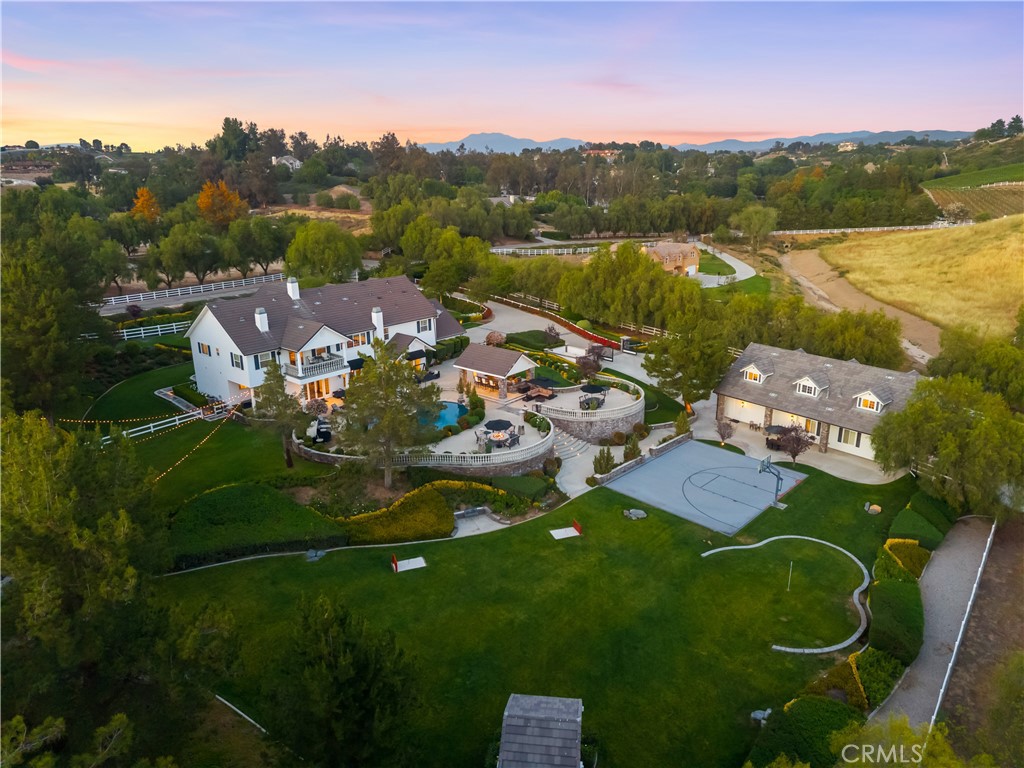 41515 Vía Del Monte Temecula, CA 92592 - Photo 62 of 64 an aerial view of a house with garden space and outdoor seating