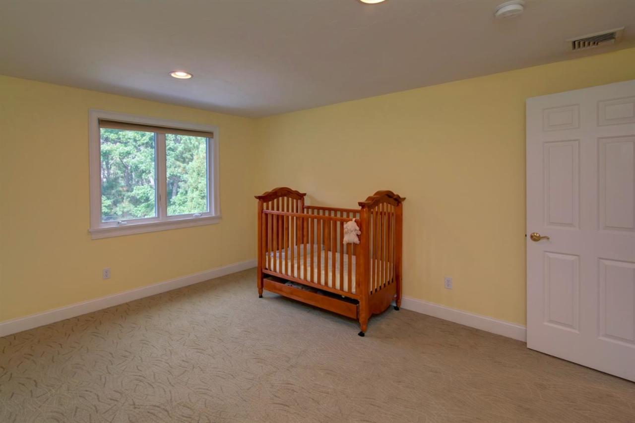 153 Cairn Ridge Road East Falmouth, MA 02536 - Photo 20 of 25 a view of an empty room with a window