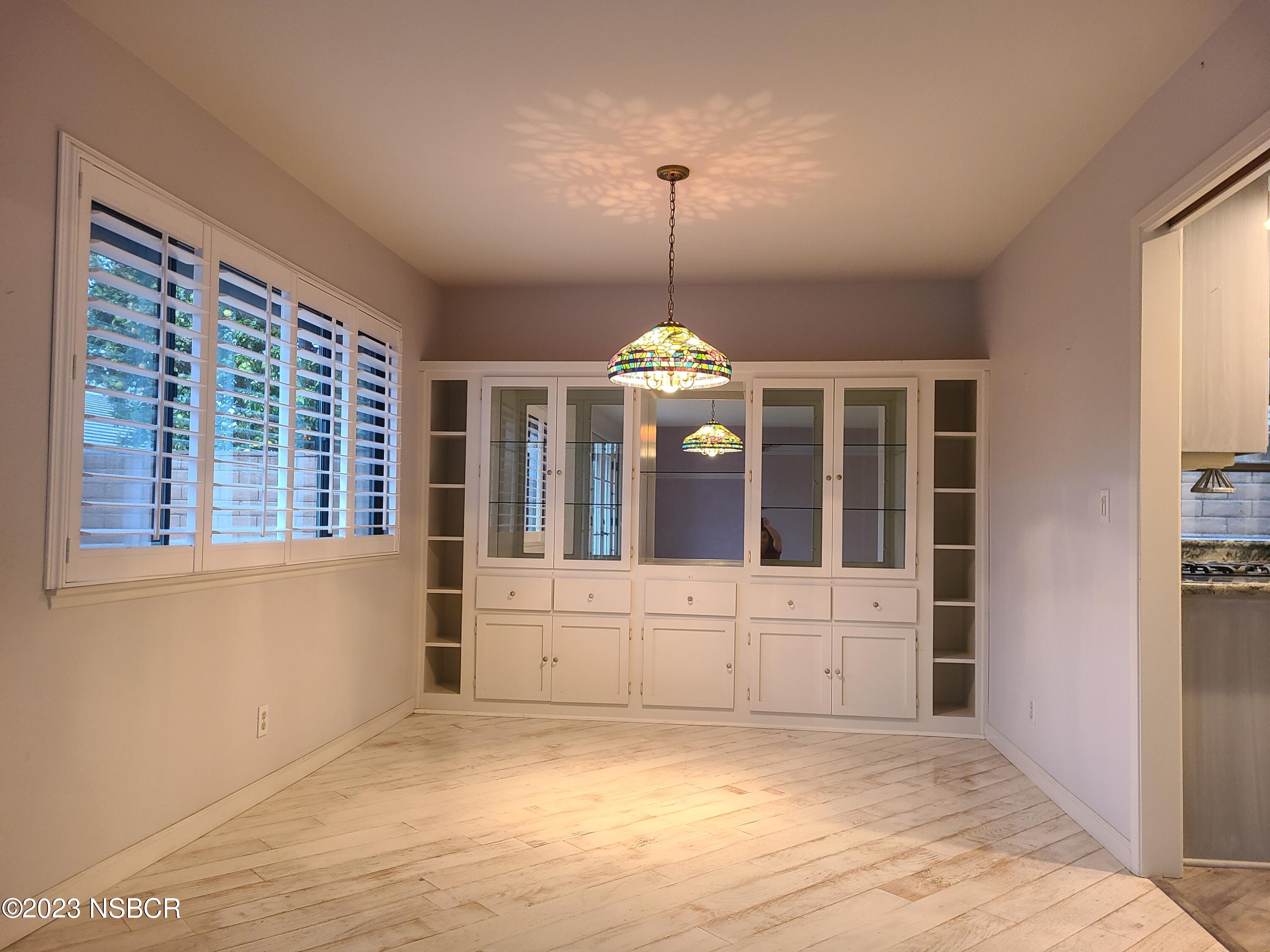 1205 North B Street Lompoc, CA 93436 - Photo 15 of 39 a view of an empty room with a window