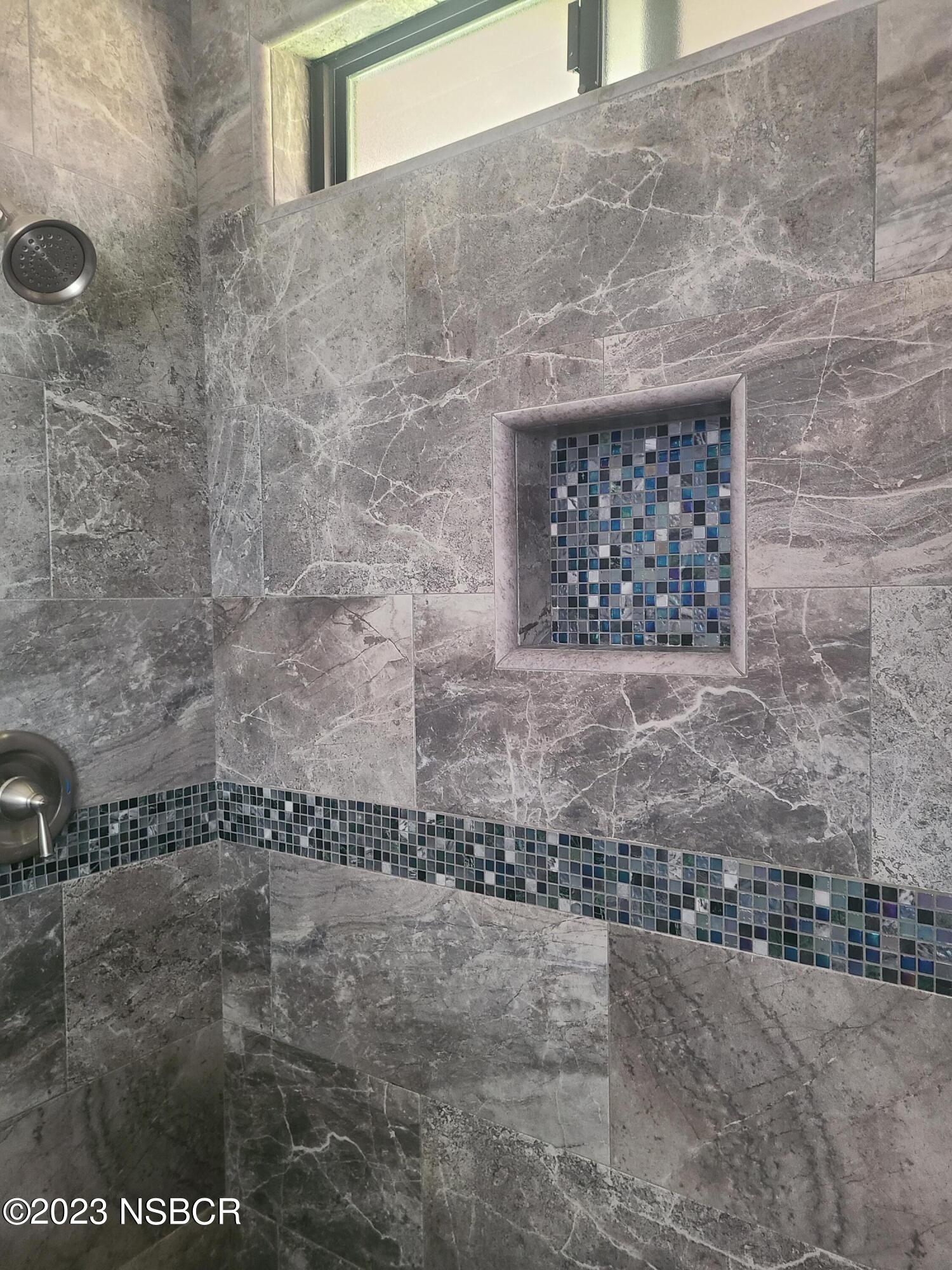 1205 North B Street Lompoc, CA 93436 - Photo 28 of 39 a brick building with glass door